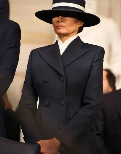 Elegant Navy Coat Worn by Melania Trump in 2025