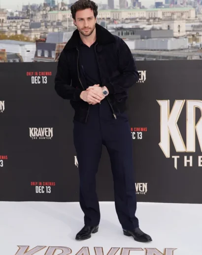Rear view of Aaron Taylor-Johnson Kraven suede bomber jacket