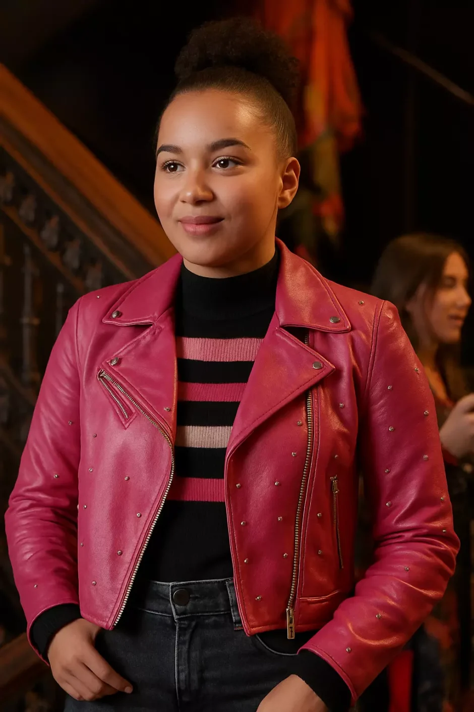 Front view of Gina High School Musical The Series pink leather jacket with studded design