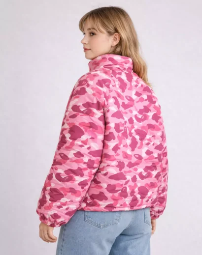 left-angle-juice-wrld-pink-camo-puffer-jacket-juice-wrld-pink-cargos-outfit Left side angle pose wearing Juice WRLD Pink Camo Puffer Jacket, urban fashion puffer coat outfit juice wrld pink cargos matching set