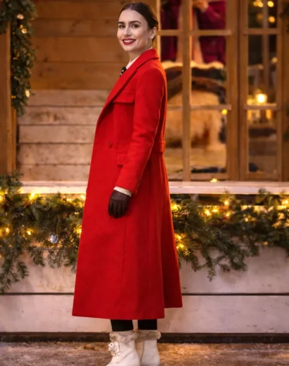emily-in-paris-red-coat-season-4-full-stand Emily in Paris red coat worn by Lily Collins, showcasing a classic trench coat Emily in Paris style with a red long silhouette from Emily in Paris red coat season 4.