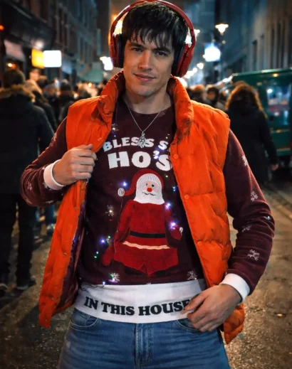 roddy ho slow horses orange puffer vest front look with headphones urban night style