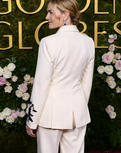 Back view of Kate Winslet white tuxedo showing clean tailoring of her black and white floral suit outfit