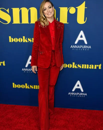 Olivia Wilde red tuxedo and crimson outfit stylish red carpet appearance