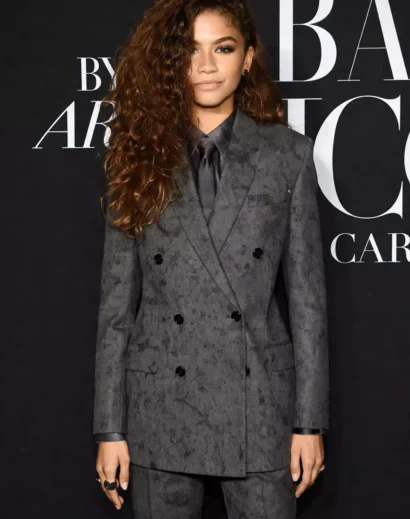 Zendaya sleek Berluti suit front pose, zendaya grey blazer and zendaya charcoal gray suit outfit with tailored fit