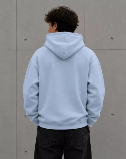 Back view of oversized all we need is hoodie blue for men plain back design casual streetwear hoodie