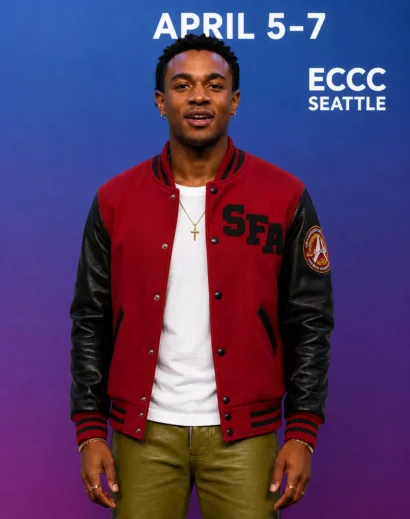 star-trek-starfleet-academy-varsity-jacket-men-front-view Star Trek Starfleet Academy Varsity Jacket front view worn by Karim Diane, featuring the iconic red and black star trek starfleet academy jacket design.
