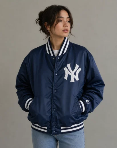Vintage Yankees Jacket front view on female model wearing a classic navy satin bomber, Starter New York Yankees MLB Fan Jackets inspired look, blue varsity jacket women.