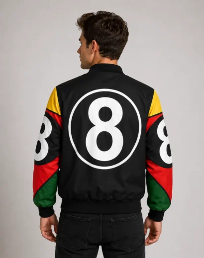 Back view of a man wearing a black 8 Ball jacket showcasing the iconic oversized 8 Ball graphic by Skinoutfits.