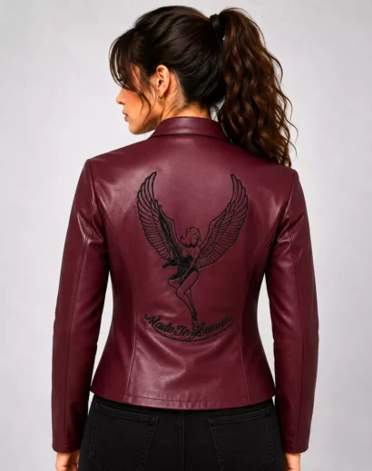 RE2 Claire red leather jacket back view on female model, highlighting the winged angel graphic and Made In Heaven design for Resident Evil cosplay