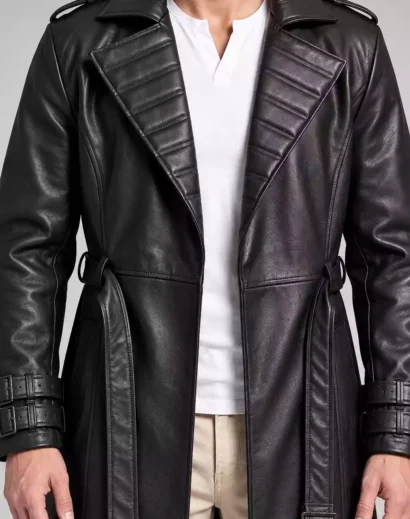mens-black-leather-coat-belt-cuff-detail Mens black leather coat close-up showing belt, padded lapel and dual buckle cuff detailing