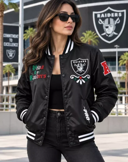 Woman wearing a Viva Los Raiders Sugar Skull Varsity Jacket in black satin with embroidered patches