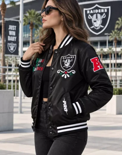 Woman modeling a women black bomber jacket with Viva Los Raiders sugar skull embroidery and varsity-style patches