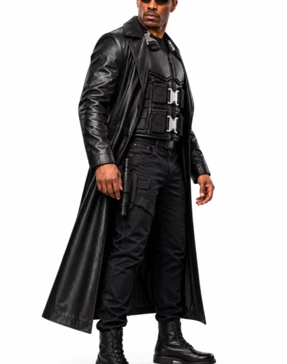 Three-quarter side view of a men's black leather armor vest costume, showing the vest's profile, side adjustment straps, layered panels and cargo pants.