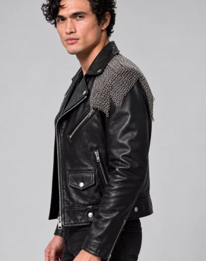Charles Melton Black Leather Biker Jacket side profile showcasing metallic shoulder detailing, premium leather texture, and silver zipper pockets.