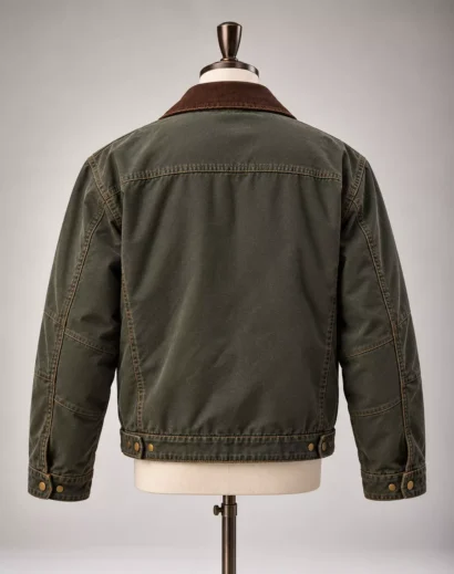 Jacob Elordi Hig Jacket detail showing the brown collar, chest zipper pocket, brass hardware, and canvas fabric