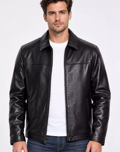 Men's black leather jacket with classic shirt collar, front zip closure, premium smooth leather texture, long sleeves and casual timeless design, styled for everyday wear.