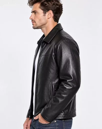 mens-black-leather-shirt-jacket-side-profile-casual-coat Men's black leather shirt jacket side profile showcasing a structured collar, tailored sleeves, natural leather creases, classic casual styling and a sleek silhouette.