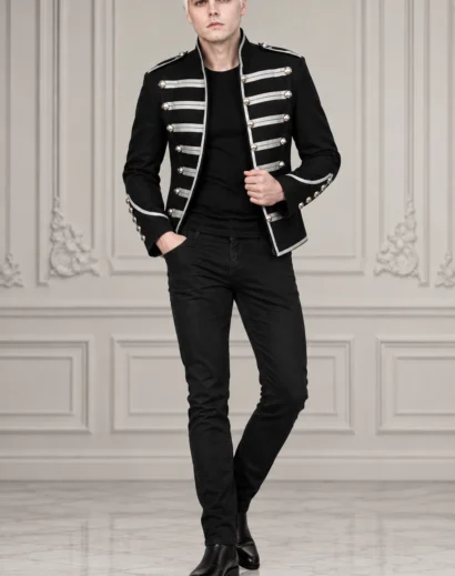 Full body view of a man wearing a Black Wool Parade Coat with Metal Buttons, a Gothic Punk Parade Coat with silver braided detailing, tailored black trousers, and a dramatic military band uniform look.