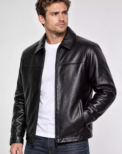 mens-classic-black-real-leather-jacket-three-quarter-view Men's classic black real leather jacket in a three-quarter back view, highlighting the premium leather finish, central back seam, shoulder detailing, full-length sleeves and contemporary casual fit.