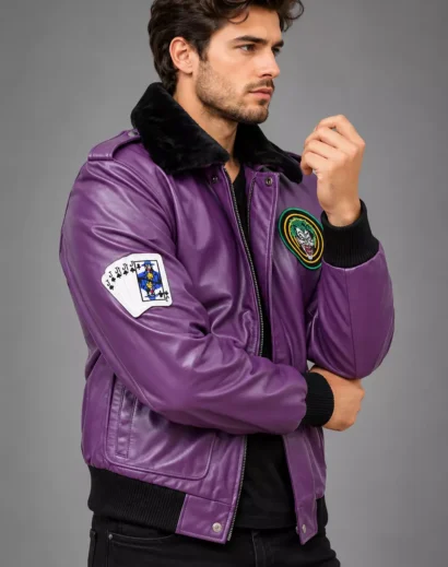 Purple leather jacket with a playing card sleeve patch and distinctive graphic details.