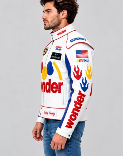 ricky-bobby-jacket-men-left-side-profile Men's Ricky Bobby movie jacket shown in left-side profile with blue racing panels, red trim, sponsor patches, and flame graphics.