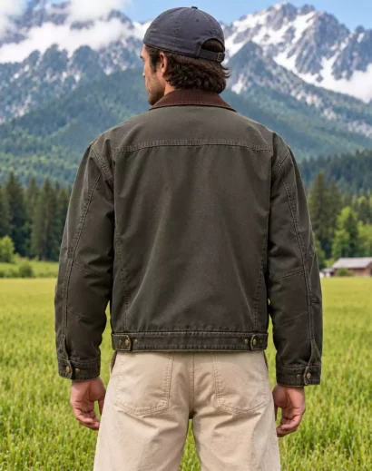 The Dog Stars Green Jacket back view showing vintage-inspired olive workwear styling and detailed stitching